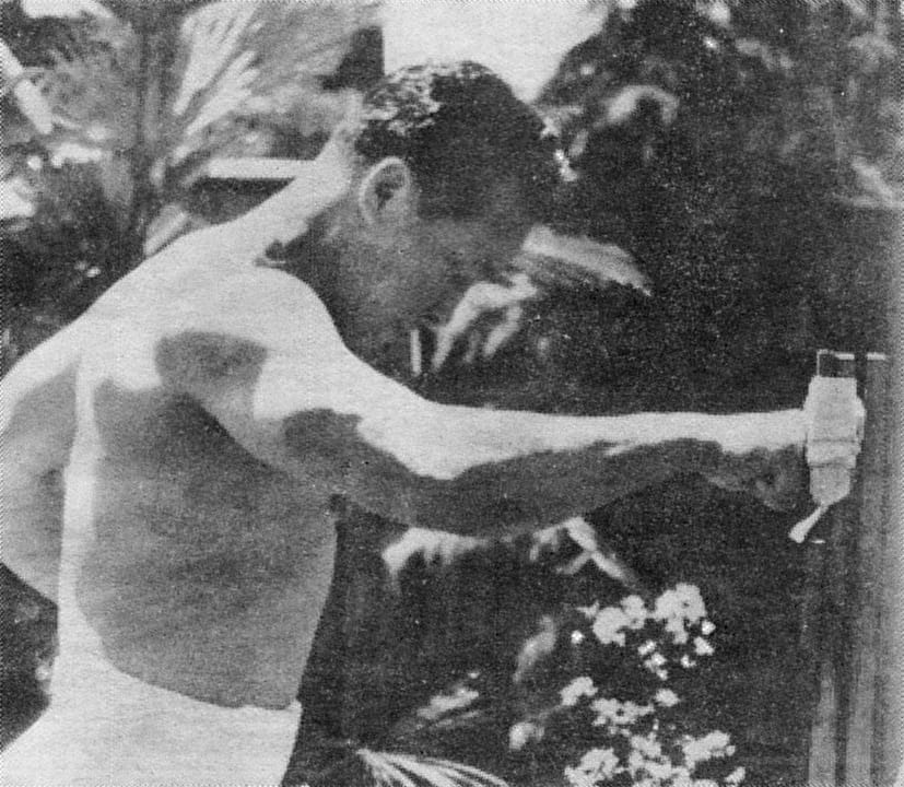 A black-and-white photograph of Ōyama Masutatsu in a karate pose.