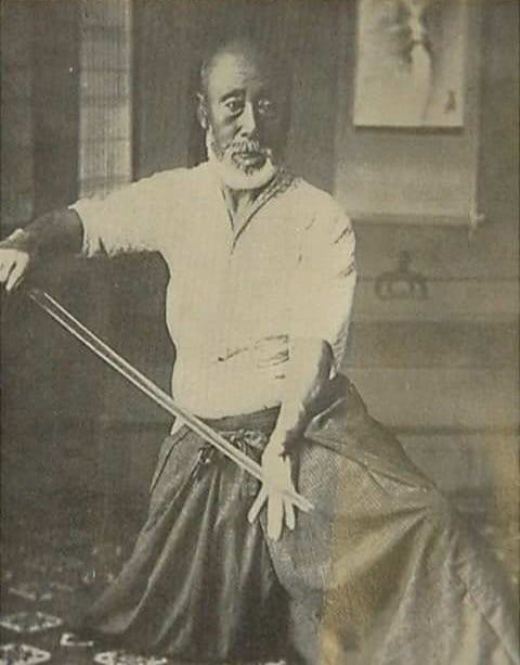 A black-and-white portrait photograph of Ōe Masamichi, who codified the modern Musō Jikiden Eishin-ryū curriculum.