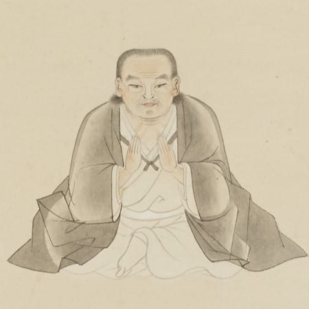 An ink portrait of Itō Ittōsai seated in robes with his hands raised before him.